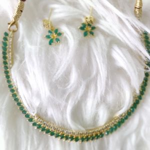 Brand new necklace sets in green and black stones